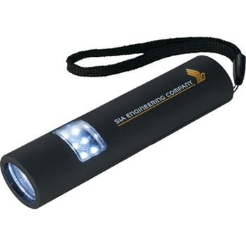Mini Grip Slim and Bright Magnetic LED Flashlight - At just the right size, this spray rubber mini flashlight is slim and bright with 3 modes. The first mode a 4 LED flashlight, the second mode a 6 LED flashlight and the third mode is both on at once. Magnetic back for easy storage or for hands free use when attached to metal surfaces. Nylon carrying strap. Push button on/off. 29 lumen. 2 AAA batteries included.
