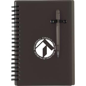 The Chronicle Spiral Notebook - Elastic pen loop on front cover. Spiral notebook with ruler measurement on back cover and matching color mini ballpoint pen. Includes 70 ruled pages.